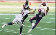  ?? Steven Senne / Associated Press ?? New England Patriots defensive back Jonathan Jones, right, intercepts a pass intended for Denver Broncos wide receiver Tim Patrick in the second half on Sunday in Foxborough, Mass.