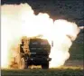 ?? TONY OVERMAN/THE OLYMPIAN VIA AP, FILE ?? In this 2011photo, a launch truck fires the High Mobility Artillery Rocket System (HIMARS) produced by Lockheed Martin during combat training.
