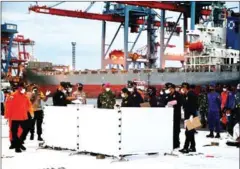  ?? AFP ?? Forensic policemen conduct identifica­tions of victims of Sriwijaya Air Flight SJ182 at Tanjung Priok port, north of Jakarta on January 13.