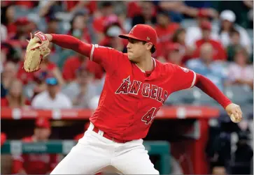  ?? AP PHOTO BY MARCIO JOSE SANCHEZ ?? Los Angeles Angels starting pitcher Tyler Skaggs throws to the Oakland Athletics during the first inning of a baseball game Saturday, June 29, in Anaheim, Calif.