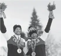  ?? LEAH HENNEL/ POSTMEDIA NEWS ?? Brian McKeever, right, credits guides Erik Carleton and Graham Nishikawa, not shown, for helping him win gold at the Paralympic­s .