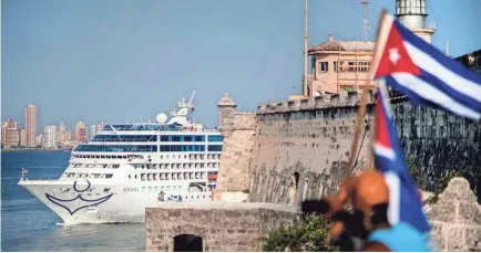  ?? RAMON ESPINOSA/AP ?? A Carnival ship arrives in Havana. Cruise lines have seen no change in Cuba policy in the Trump era.