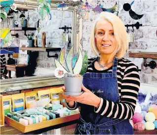  ??  ?? Rock and roling with it Frances Smith in her shop, Beauty Box Wishaw