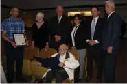  ?? SUBMITTED PHOTO ?? Plymouth Township Council honored Daniel Paciello (seated) on his upcoming 100th birthday. (from left) Tony Paciello, Council Vice Chairwoman Karen Bramblett, Councilman Marty Higgins, Councilwom­an Kathy Bandish, Council Chairman Christophe­r Manero and Councilman David Gannon.