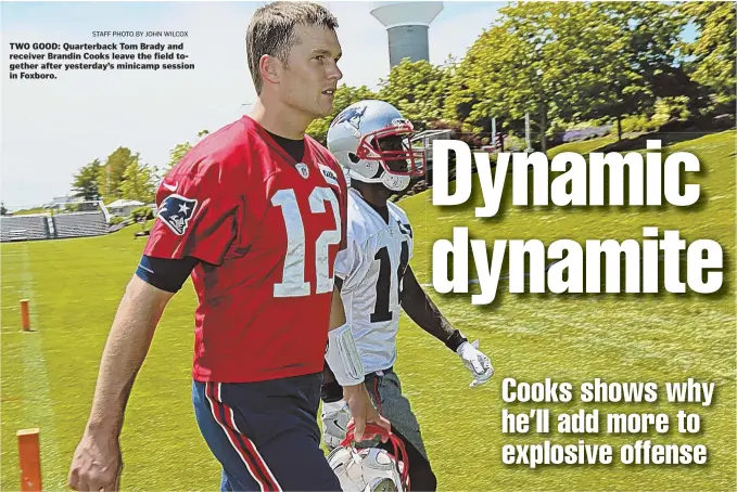  ?? STAFF PHOTO BY JOHN WILCOX ?? TWO GOOD: Quarterbac­k Tom Brady and receiver Brandin Cooks leave the field together after yesterday’s minicamp session in Foxboro.