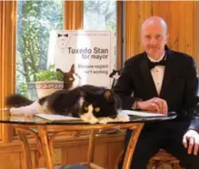  ??  ?? Hugh with the late Tuxedo Stan, whose brother, Earl Gray, is a contestant.