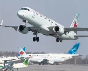  ?? ANDREW VAUGHAN THE CANADIAN PRESS FILE PHOTO ?? Air Canada hopes to take advantage of a renewed appetite for corporate travel in the United States as the carrier shores up its U.S. flight schedule.