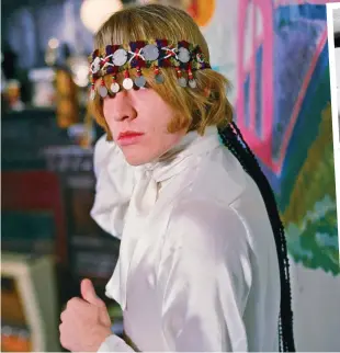  ??  ?? Jumpin’ Jack Flashy: Brian Jones, in his Fulham Road flat, wears a headband possibly borrowed from his girlfriend, Anita Pallenberg