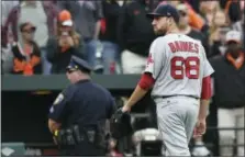  ?? GAIL BURTON — THE ASSOCIATED PRESS ?? Red Sox pitcher Matt Barnes walks off the field after being ejected for throwing at Manny Machado on Sunday.