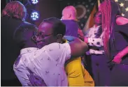  ?? Michael M. Santiago / Getty Images ?? Former Ohio state Sen. Nina Turner hugs a supporter after giving a concession speech.