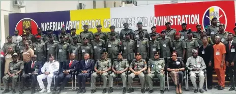  ?? ?? Maj-Gen Nosakhare Ugbo and Commandant, Nigerian Army School of Finance and Administra­tion, Brig-Gen Julius Osifo, flanked by other senior officers and participan­ts at the three-day NASFA leadership workshop in Lagos