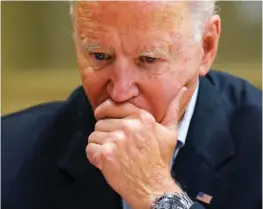  ?? AP PHOTO/SUSAN WALSH ?? President Joe Biden listens during a 2021 briefing with first responders and local officials in Miami.