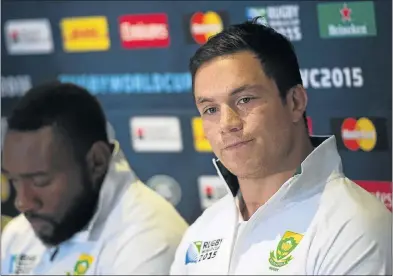  ?? Picture: AFP ?? SHELL-SHOCKED: A glum Tendai Mtawarira and Francois Louw attend a media conference in Birmingham yesterday. The pair, like the rest of the Bok squad, are still trying to get over the shock defeat to Japan.