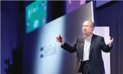  ??  ?? TOKYO: In this photo, SoftBank Group Corp. Chief Executive Officer Masayoshi Son speaks during a SoftBank World presentati­on in Tokyo.—AP