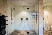  ?? TIDA ?? Landmark’s Geoff Penrose says a free-standing shower is a better option than a shower over a bath.