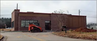  ??  ?? Above: Work is getting nearcomple­tion on the new Popeye’s Chicken in Rockmart. Right: As the year wascoming to a close in Cedartown, Rite Aid on North Main Street got a name change to Walgreens, which bought the pharmacy chain in years past.