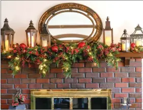  ??  ?? Lanterns are a trendy item for holiday decorating this year. A candle in each lantern results in a rustic look. Also popular are small holiday scenes, greenery, glittering Christmas trees and other festive items tucked inside lanterns. (Fernando...