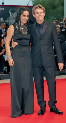  ??  ?? Red Carpet arrival: Willem Dafoe with his wife Giada Colagrande