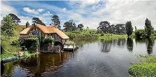  ??  ?? The Hobbiton movie set remains a popular attraction for tourists.