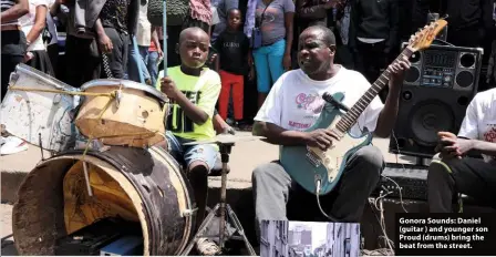  ?? ?? Gonora Sounds: Daniel (guitar ) and younger son Proud (drums) bring the beat from the street.