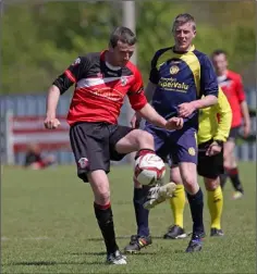  ??  ?? Kenneth Cahill on the ball for St. Leonards.