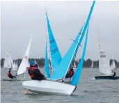 ??  ?? New and old one-designs race alongside one another in England, where more sailors embrace dinghy handicap racing. PHOTO :