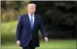  ?? MANUEL BALCE CENETA - THE ASSOCIATED PRESS ?? President Donald Trump walks towards reporters on the South Lawn of the White House in Washington, Friday.