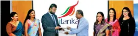  ??  ?? Colombo Institute of Research and Psychology Chairman Dr. Darshan Perera exchanging MOU documents with Srilankan Airlines Human Resources Head Pradeepa Kekulawala