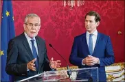  ?? MICHAEL GRUBER / GETTY IMAGES ?? Austrian President Alexander Van der Bellen (left) and Chancellor Sebastian Kurz speak to the media on Sunday in Vienna. The two leaders announced Austria will hold snap elections in September.