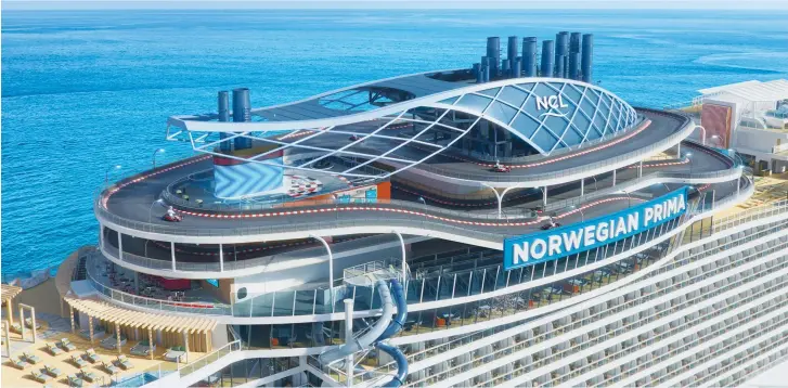  ?? (NCL) ?? THE ‘NORWEGIAN PRIMA’ – at 18 stories it is a huge ocean liner, at full capacity able to carry some 3,100 guests and a staff of 1,600.