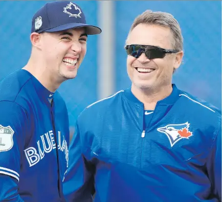  ?? NATHAN DENETTE/THE CANADIAN PRESS ?? Toronto Blue Jays manager John Gibbons, seen sharing a laugh with starting pitcher Aaron Sanchez at spring training in Dunedin, Fla., on Wednesday, says he has “no concerns” about Sanchez’s ability to start for a full season after last year’s campaign.