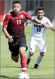  ?? NWA Democrat-Gazette/CHARLIE KAIJO ?? Wesly Robinson scored in the 34th minute to lead Russellvil­le to a 1-0 victory over Siloam Springs in the Class 5A boys soccer state championsh­ip Friday at Razorback Field in Fayettevil­le.