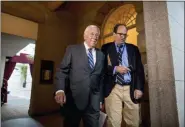  ?? ANDREW HARNIK — THE ASSOCIATED PRESS ?? House Majority Leader Steny Hoyer of Md., left, arrives for a House Democratic caucus meeting Wednesday on Capitol Hill in Washington.