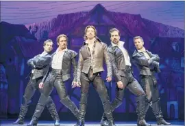  ?? Joan Marcus O&M Co. ?? CHRISTIAN BORLE, center, is a preening Shakespear­e in “Something Rotten!”