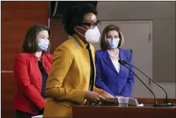  ?? CHIP SOMODEVILL­A — POOL VIA AP ?? Rep. Lauren Underwood, D-Ill., center, speaks during a news conference with Speaker of the House Nancy Pelosi, D-Calif., right, and Rep. Angie Craig, D-Minn., left, on Capitol Hill in Washington, March 19.