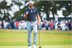  ?? AP ?? Dustin Johnson celebrates a shot during the second round. Johnson tops the leaderboar­d with a four-shot lead.