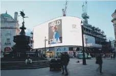  ??  ?? Johanna's photo on a billboard at Piccadilly Circus, London.