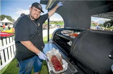  ?? ANDY JACKSON/ STUFF ?? Craig Leathley’s rib and briskets from his Jack Daniel’s low and slow BBQ will be available all weekend at the New Zealand Food Truck Festival, at East End Reserve in New Plymouth.