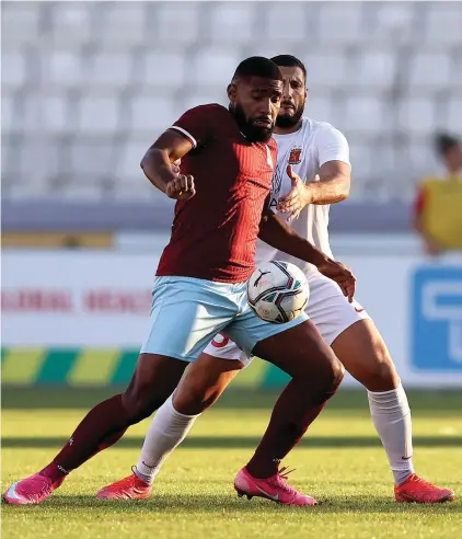  ?? ?? Gzira United's Jefferson Assis (front) shields the ball from Valletta’s Ryan Camilleri. Photo: Domenic Aquilina