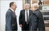  ?? PHOTO BY ALEXANDER SHCHERBAK/TASS ?? In a photo made available by the Russian Foreign Ministry, Russia’s Foreign Minister Sergey Lavrov, left, President Donald Trump and Ambassador to the U.S. Sergey Kislyak talk during their meeting.