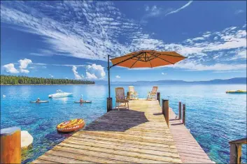  ?? COURTESY ?? This $8.9 million Lake Tahoe vacation home has its own pier.