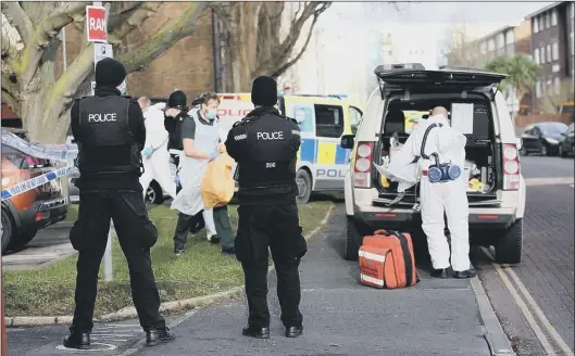  ??  ?? STABBING Police at the scene at Pickwick House, Wingfield Street, Buckland