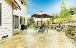  ?? DREAMSTIME ?? Patios make a great addition to any home for outdoor entertaini­ng.