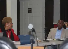  ?? (Pine Bluff
Commercial/Eplunus Colvin) ?? Pine Bluff Mayor Shirley Washington and Parks and Recreation Director Samuel Glover prepare for the Public Works budget committee meeting on Wednesday.