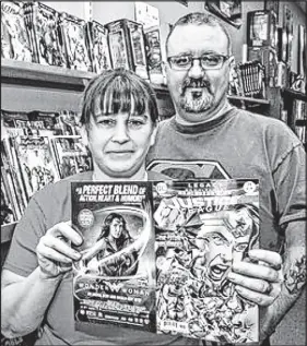  ?? ToM ayERS/tHE CHRoniCLE HERaLd ?? Danielle and Jeff Gusso, owners of My Secret Identity Comics and Games in Sydney River, say they were surprised after the Justice League Rebirth issue No. 29 flew off the shelves in a day.