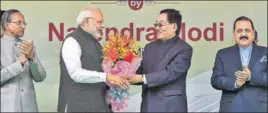  ?? PTI ?? Sikkim CM Pawan Kumar Chamling greets PM Narendra Modi as Sikkim governor Ganga Prasad (L) and Minister of State at PMO Jitendra Singh (R) look on at the inaugurati­on of Pakyong airport, Monday.