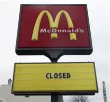  ?? MIKE GROLL/THE ASSOCIATED PRESS FILE PHOTO ?? For the first time in more than 40 years, the number of McDonald’s outlets in the U.S. is shrinking. New “better burger” chains are stealing customers.