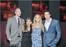  ?? ARAYA DIAZ/GETTY IMAGES ?? From left, Gallows cast members Ryan Shoos, Pfeifer Brown, Cassidy Gifford and Reese Mishler ham it up at a screening.