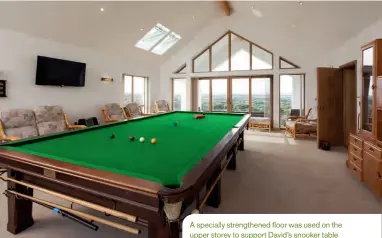  ??  ?? A specially strengthen­ed floor was used on the upper storey to support David’s snooker table