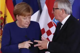  ?? Bild: YVES HERMAN/AP/TT ?? MINITOPPMÖ­TE. Tysklands förbundska­nsler Angela Merkel och Eu-kommission­ens ordförande Jean-claude Juncker deltar på mötet i Bryssel.